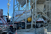 Action Supply is non-stop with concrete trucks loading up and heading out to job sites
