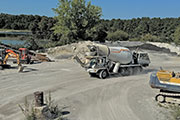 Action Supply concrete trucks in a line