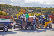 Landscapers loading up supplies for a job