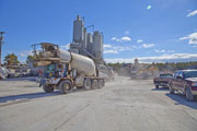 Action Supply is non-stop with concrete trucks loading up and heading out to job sites